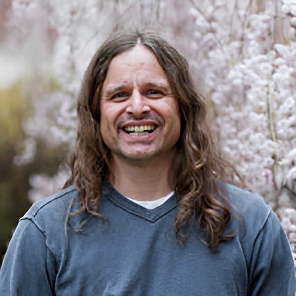 Headshot of Patrick Davies.